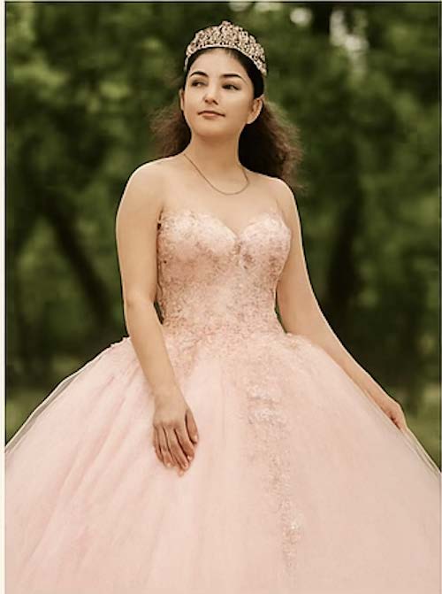 Quinceañera in pink gown